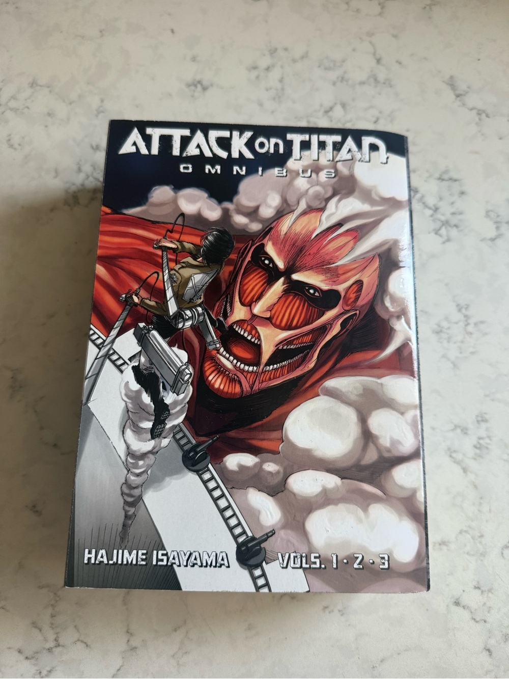 2 books Attack on Titan and Five Nights at Freddy’s